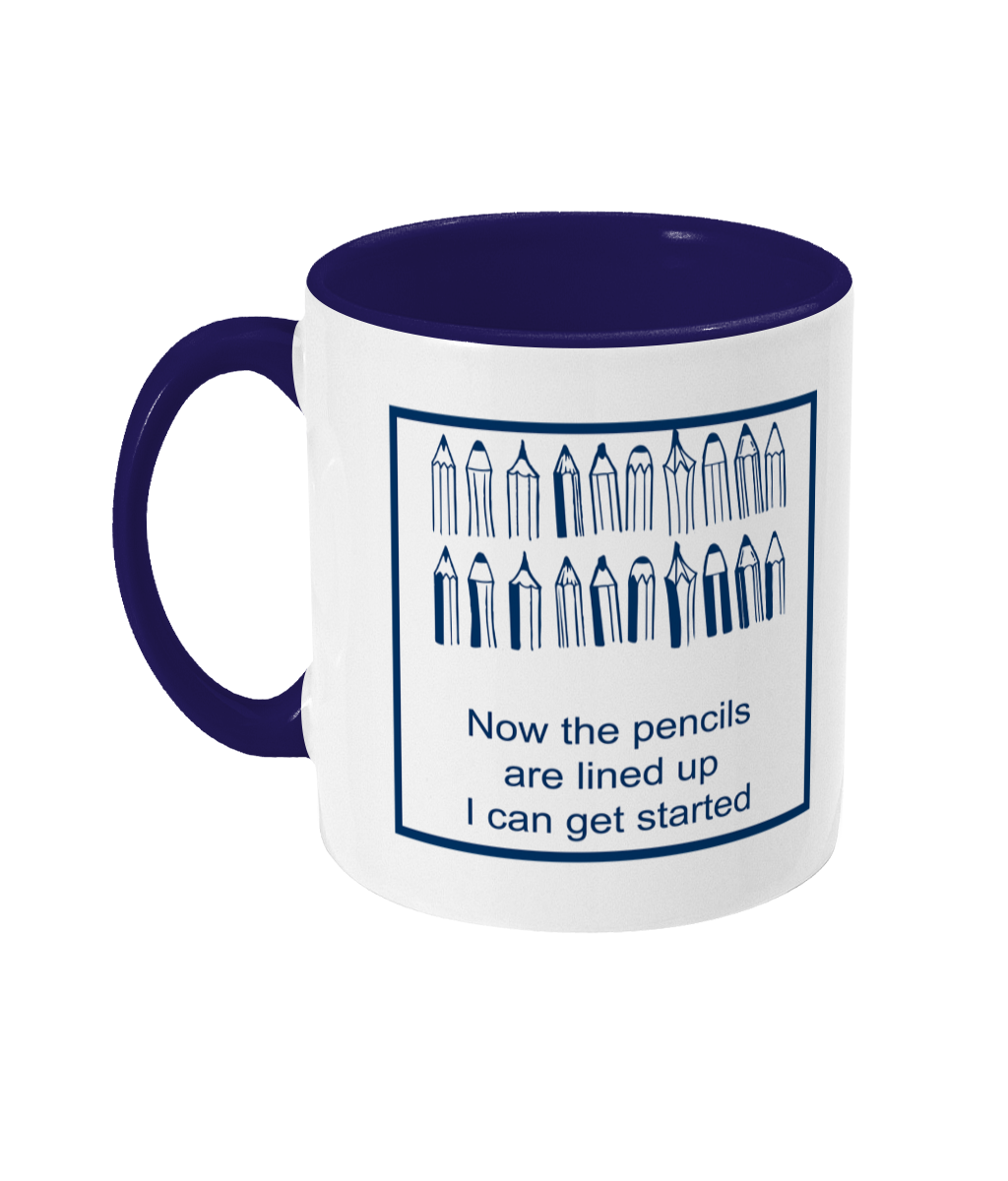 two tone blue and white ceramic mug now the pencils are lined up I can get started with 2 rows pf pencils