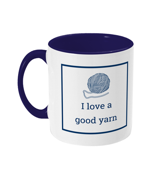 two tone blue and white ceramic mug I love a good yarn with ball of yarn