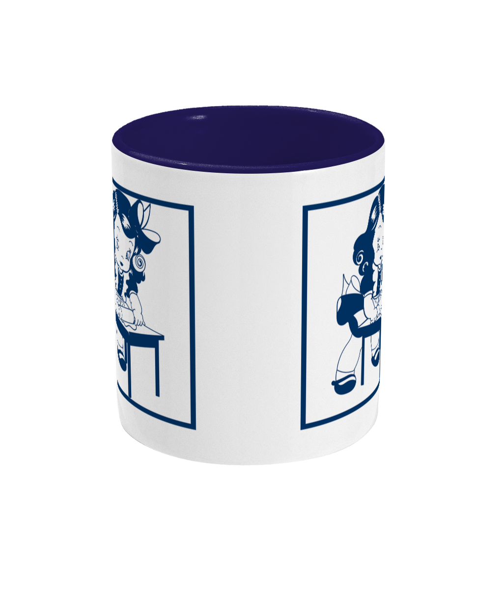 two tone blue and white ceramic mug git rolling out something standing ata table