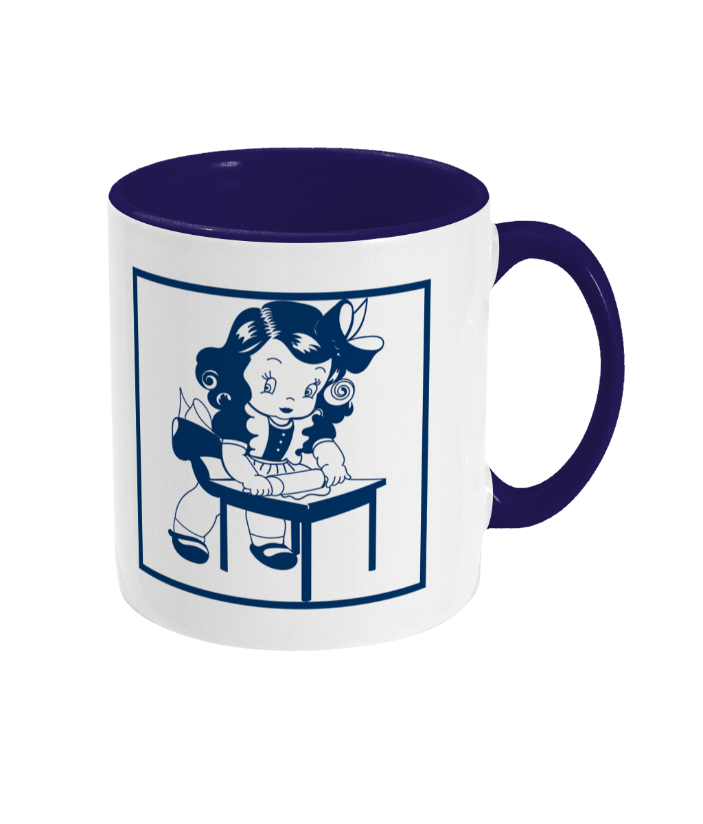 two tone blue and white ceramic mug git rolling out something standing ata table