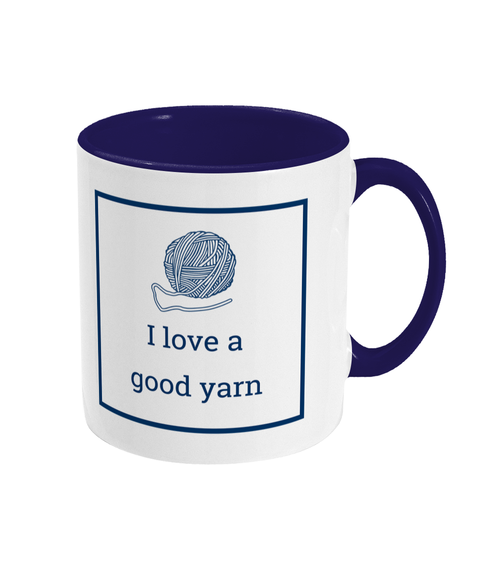 two tone blue and white ceramic mug I love a good yarn with ball of yarn