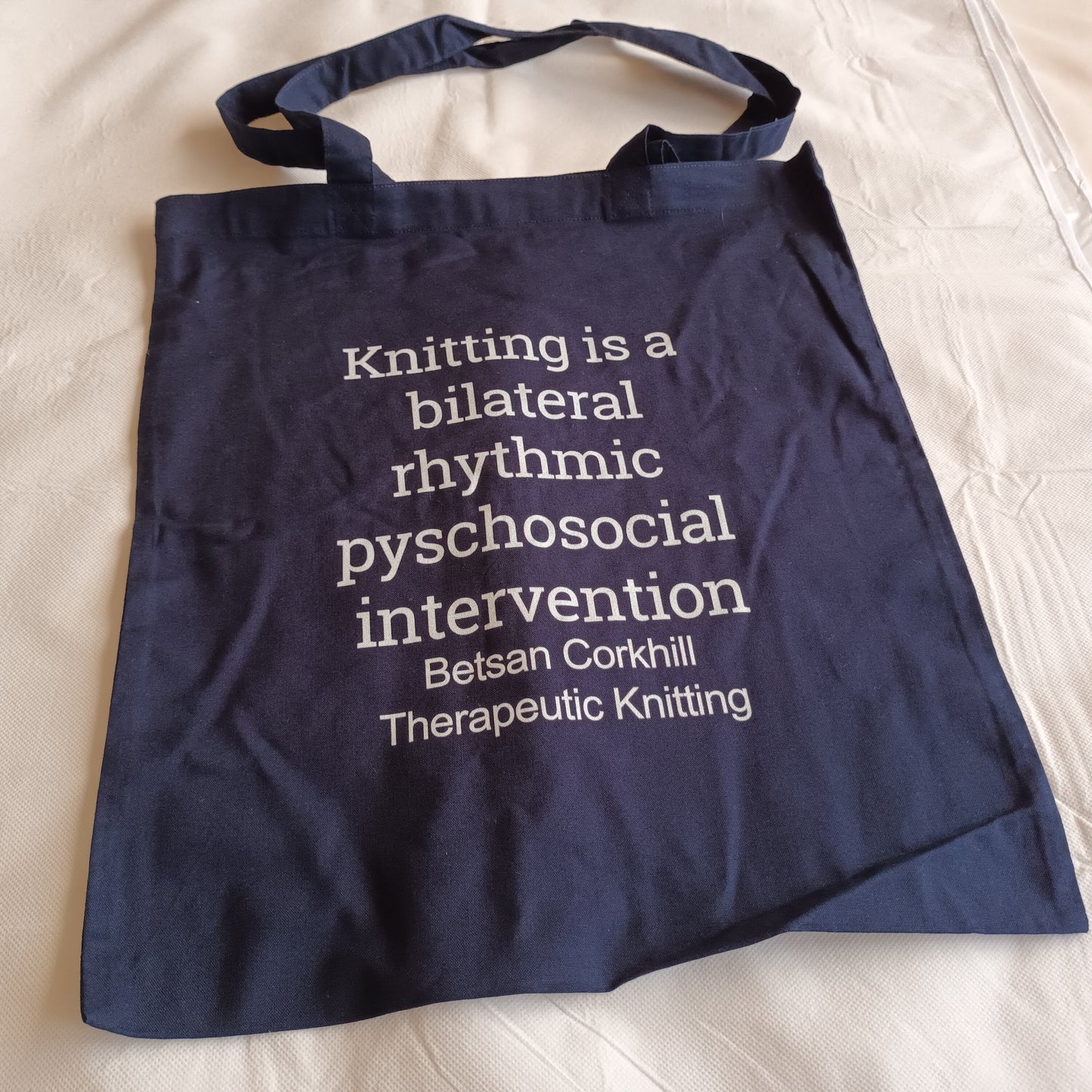navy tote bag white print knitting is a bilateral rhythmic psychosocial intervention