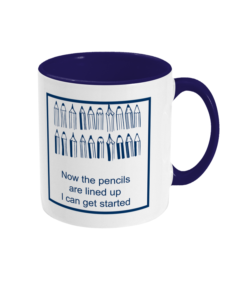 two tone blue and white ceramic mug now the pencils are lined up I can get started with 2 rows pf pencils