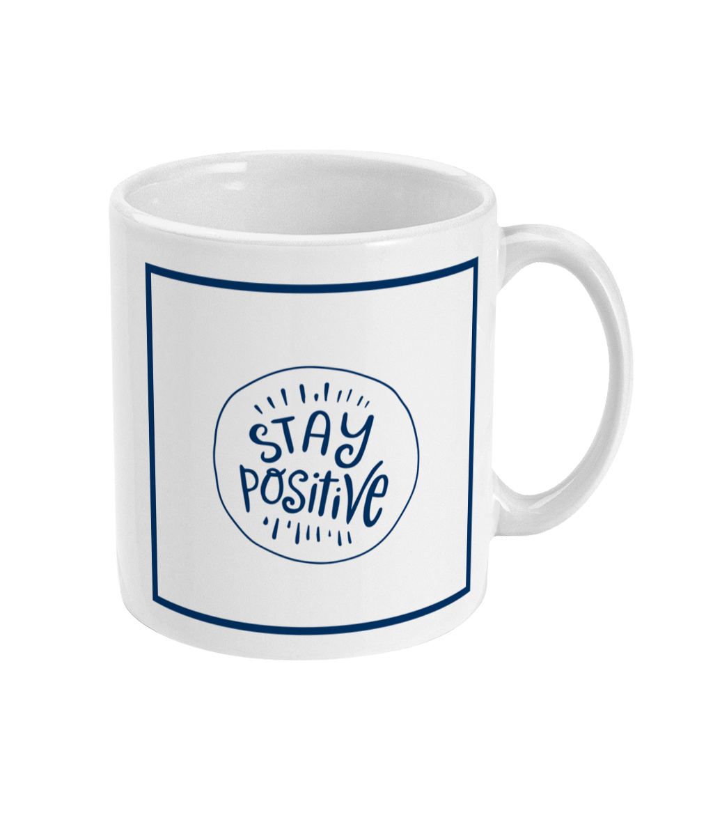 mug with stay positive logo printed on it
