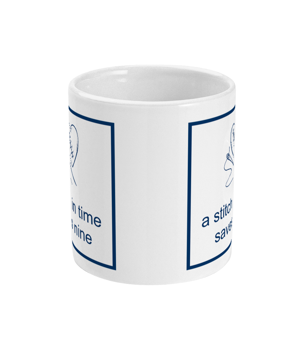 mug with a stitch in time saves nine plus a heart that has been stitched up