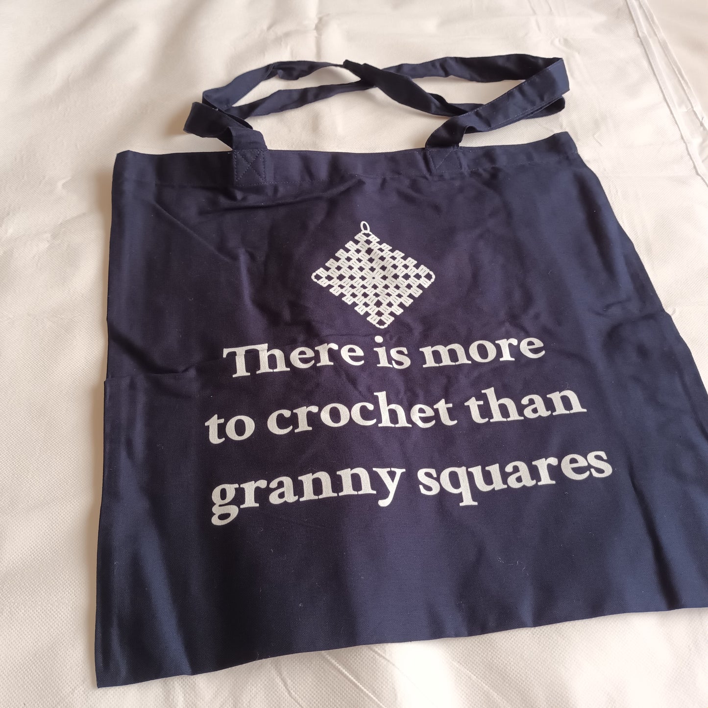navy tote bag white print there is more to crochet than granny squares