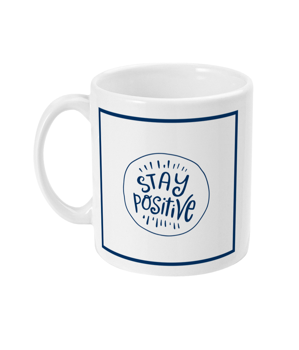 mug with stay positive logo printed on it
