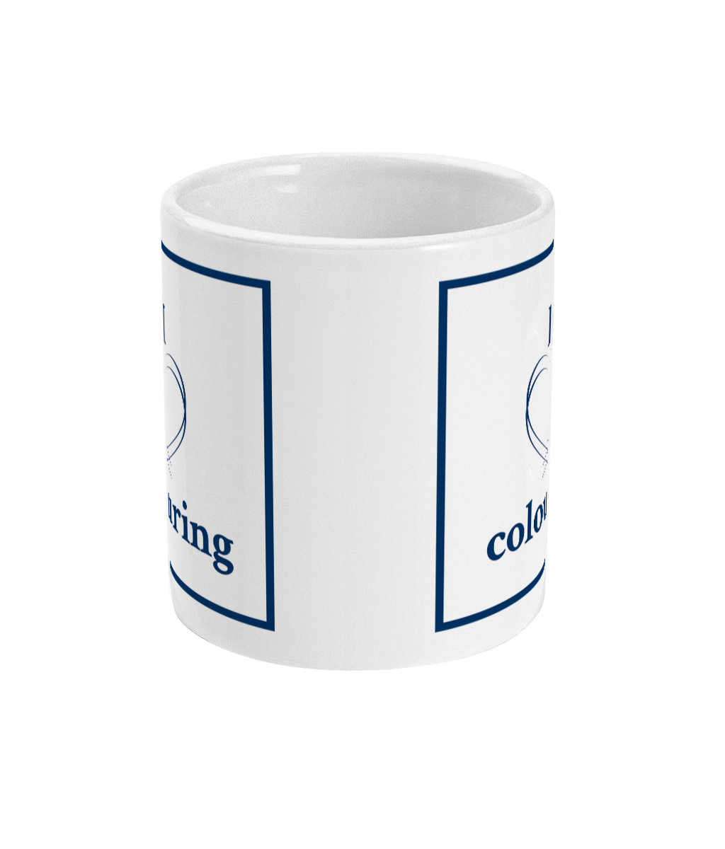 mug with i love colouring printed on it