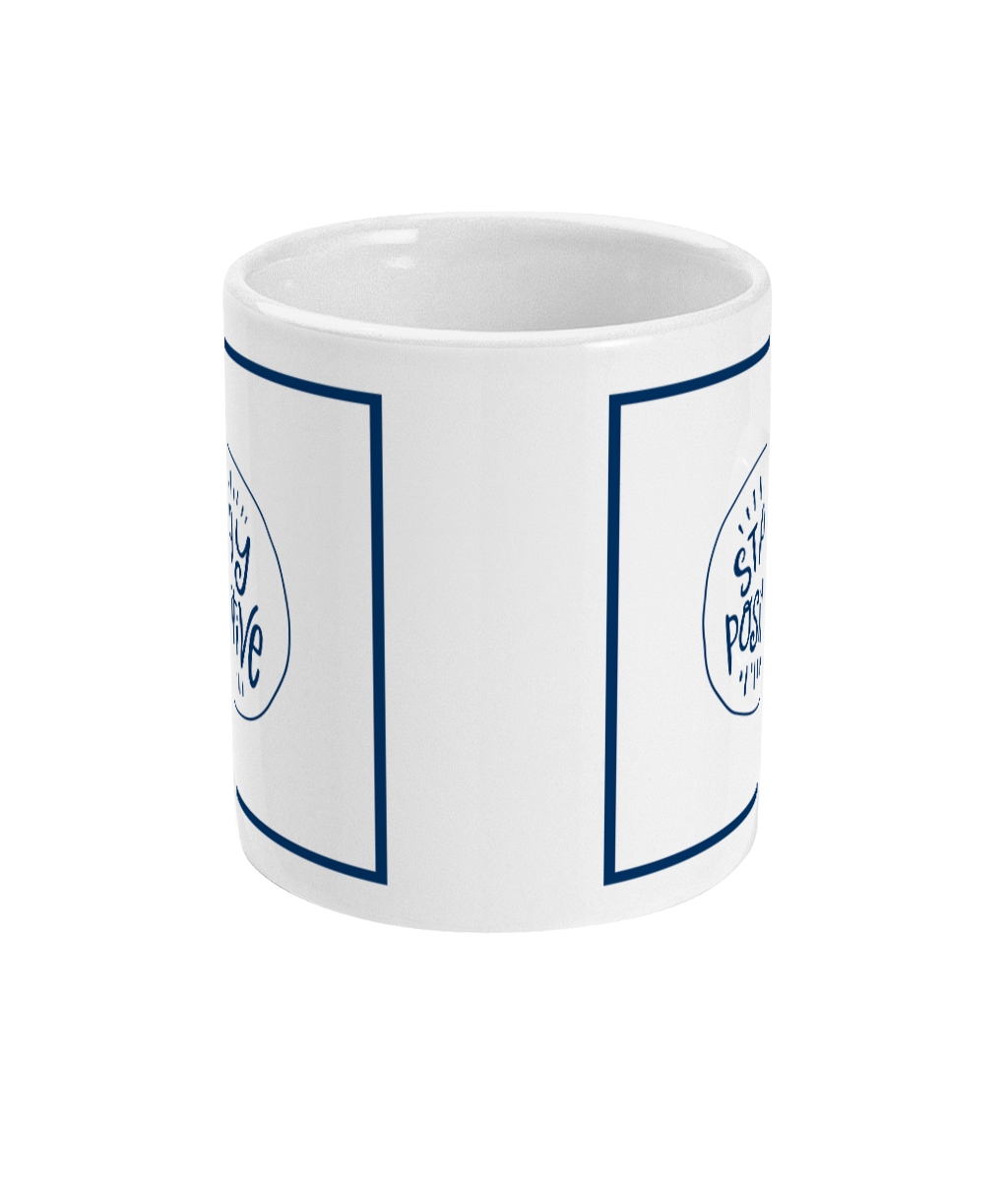 mug with stay positive logo printed on it